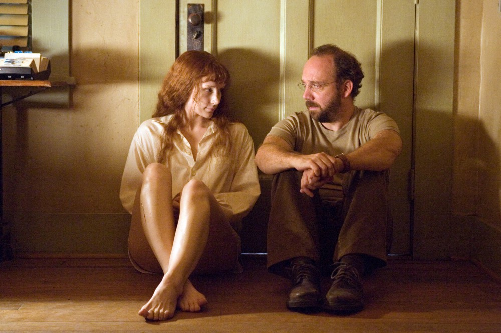 Bryce Dallas Howard e Paul Giamatti em A Dama na Água (2006)